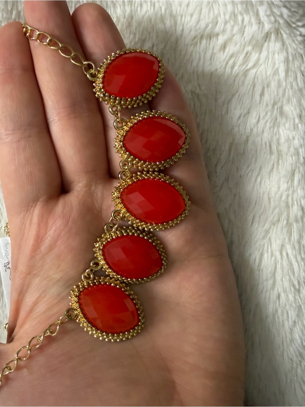 Gold-Tone Bracelet with Red Faceted Stones